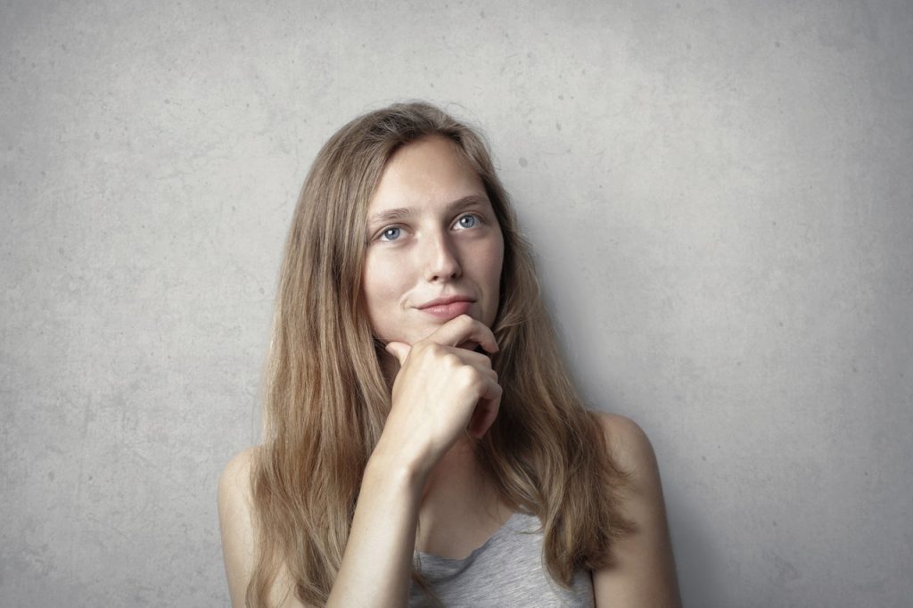 Girl thinking about taking french lessons