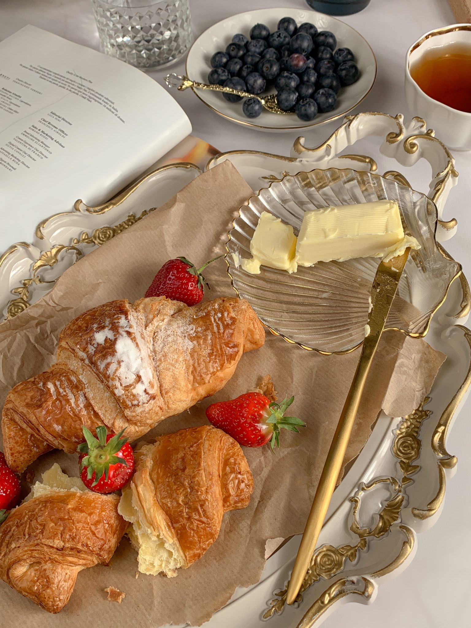 French immersion with croissant, baguette, fruits and tea - 6 Ways To Completely Immerse Yourself In French Culture